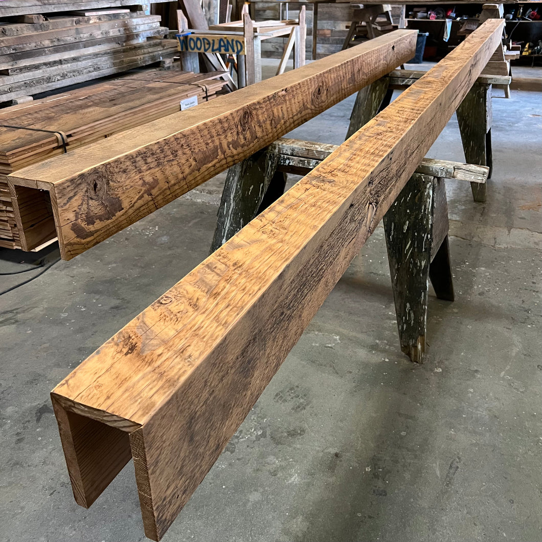 reclaimed wood box beams sanded look.