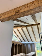 Load image into Gallery viewer, hand hewn box beams install close up
